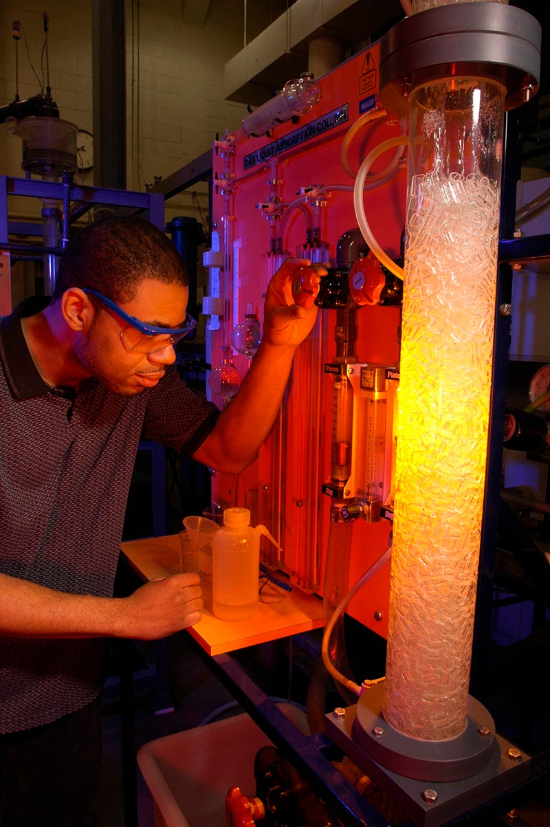 student in chem engineering lab