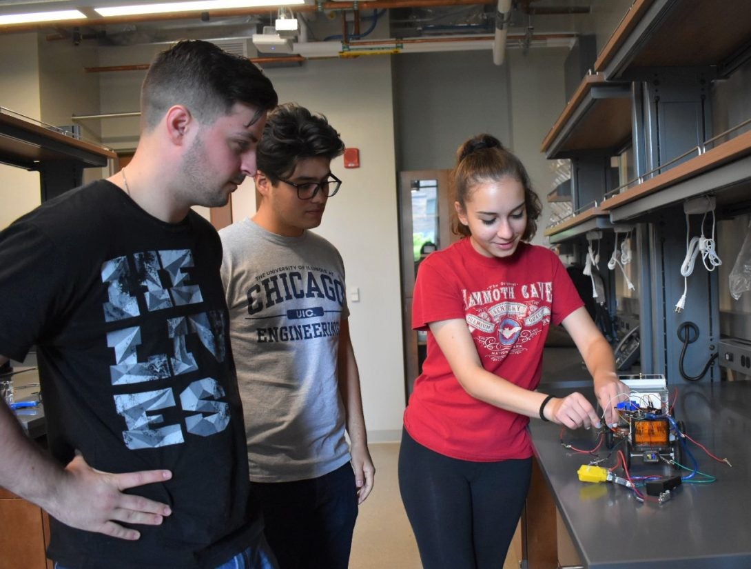 students working with lab equipment