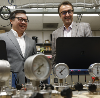 Professors completing battery research
                  