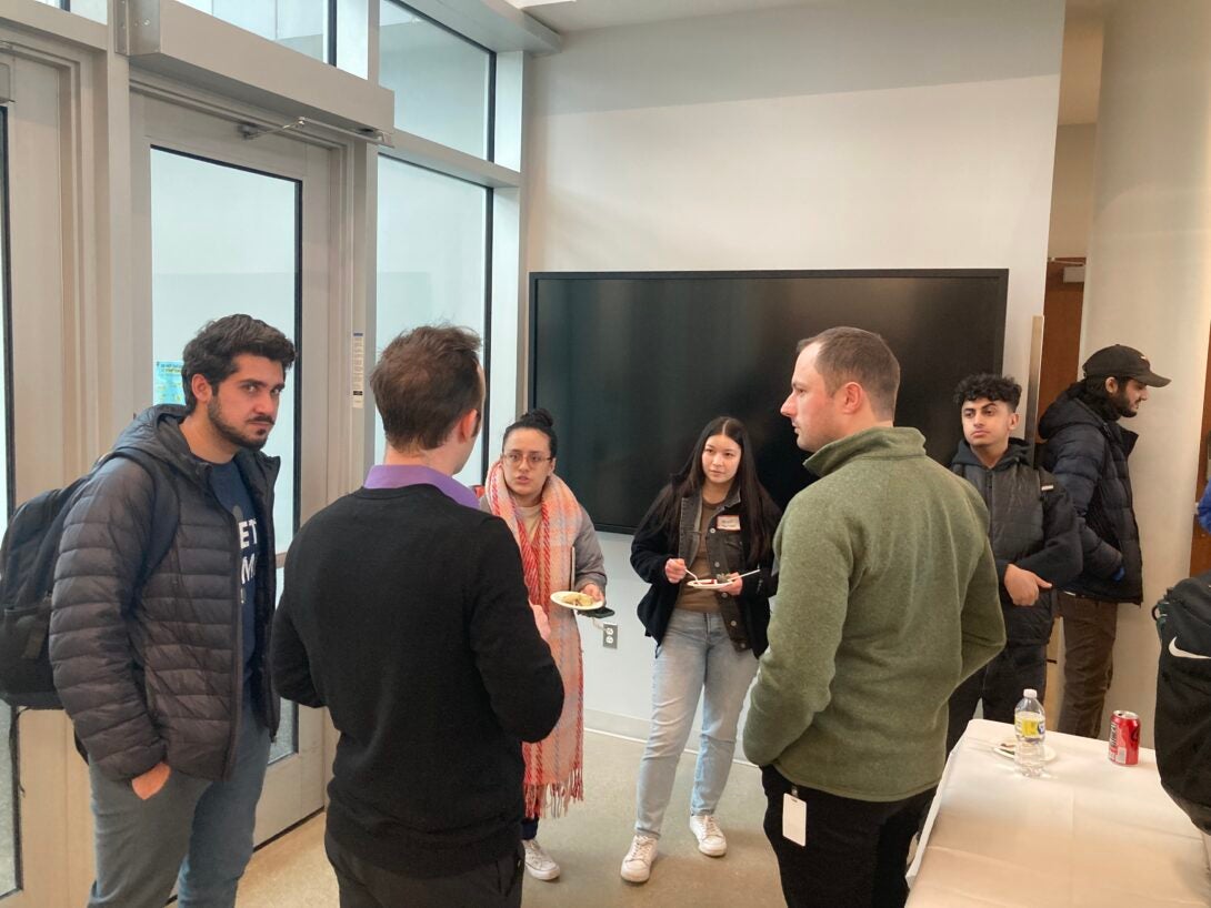 UIC Chemical Engineering current students talk to alumni after the industry day panel.