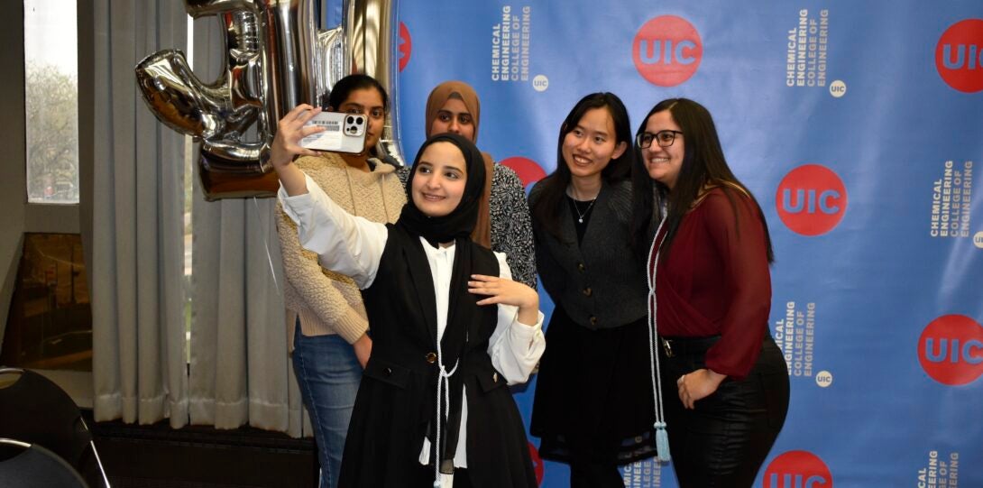 Students take a selfie at the banquet