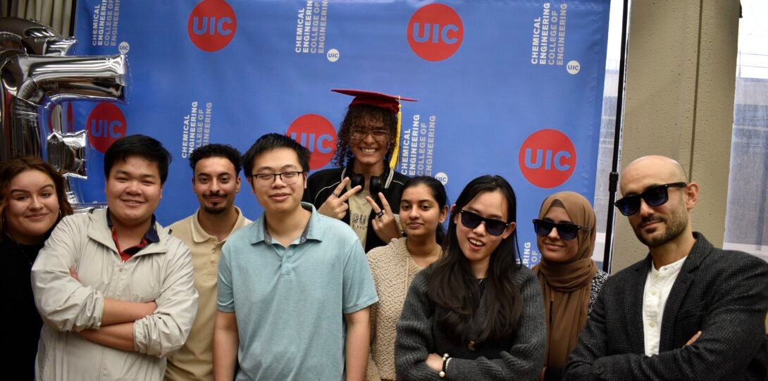 Students pose for a photo with Clinical Assistant Professor Korosh Torabi