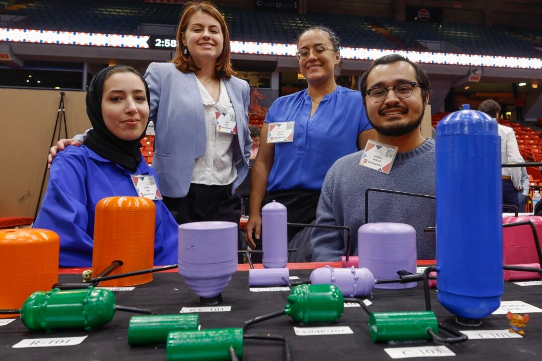 Seniors Emina Abdic, Ranim Bajes, Astrid Vargas, and Andrew Murillo show off their 3D model of the manufacturing process.