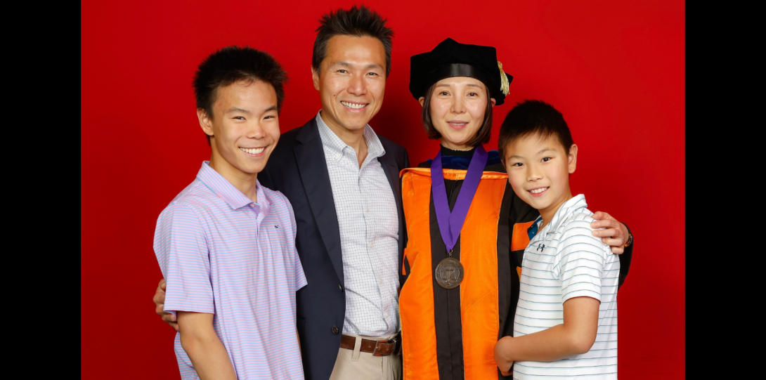 CHE professor Ying Liu and her family at the Investiture ceremony.