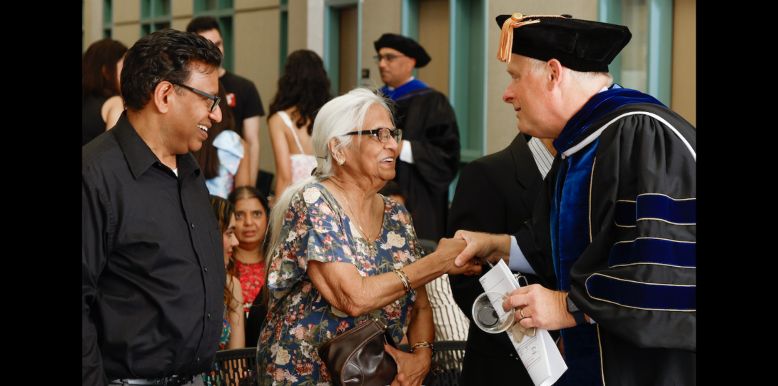 Members of the Saxena family and College of Engineering Dean Pete Nelson.