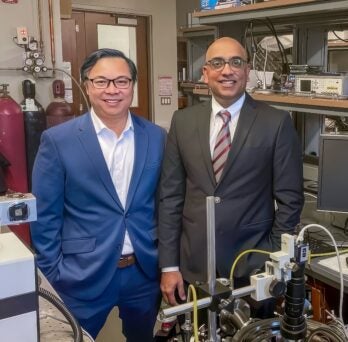 Chemical Engineering Associate Professor Anh Ngo and Professor Vikas Berry in Ngo's lab 