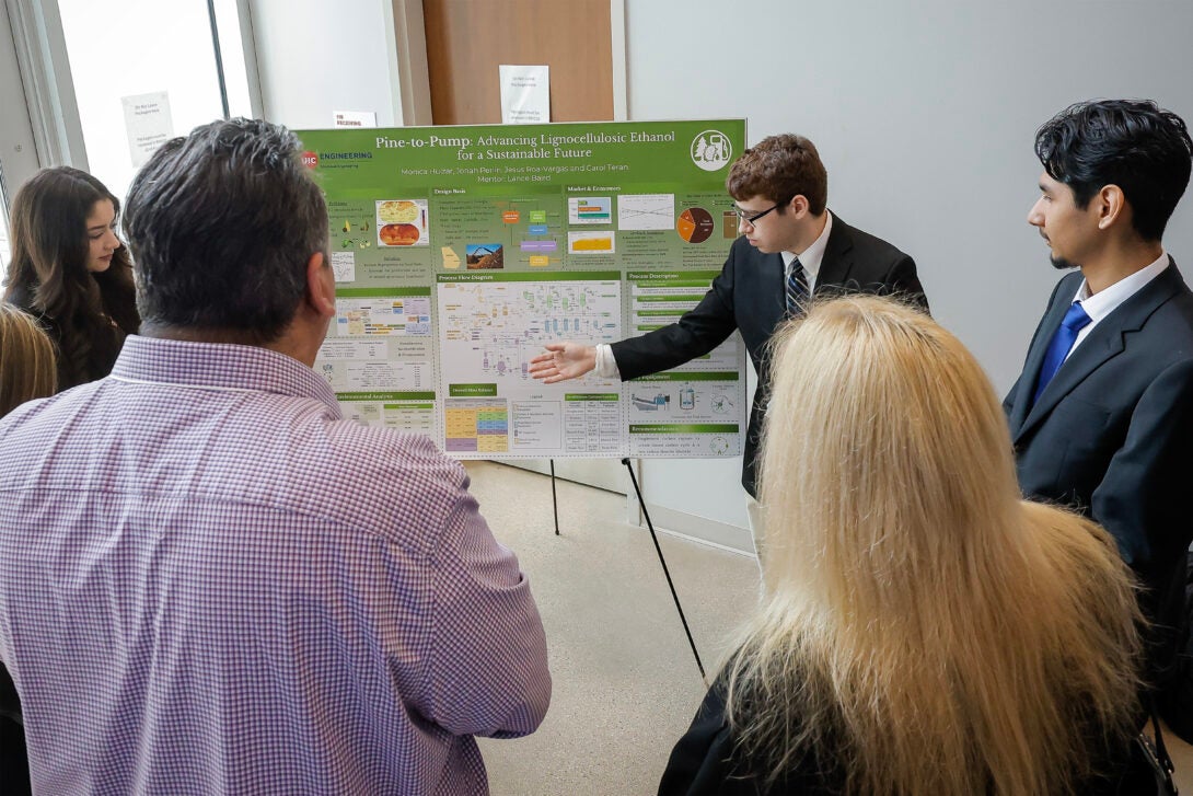 University of Illinois Chicago College of Engineering CHE senior Jonah Perlin discusses their research poster at the Design Showcase as an addition to the Expo senior design event at EIB, April 28, 2025.
